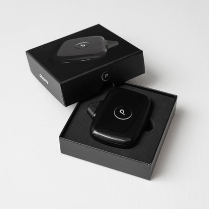 Gravity Portable Charger in Box Shown in Santorini Black
